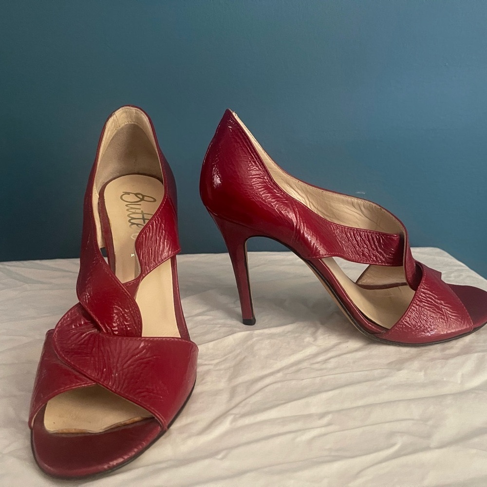 BUTTER red open toe heels.